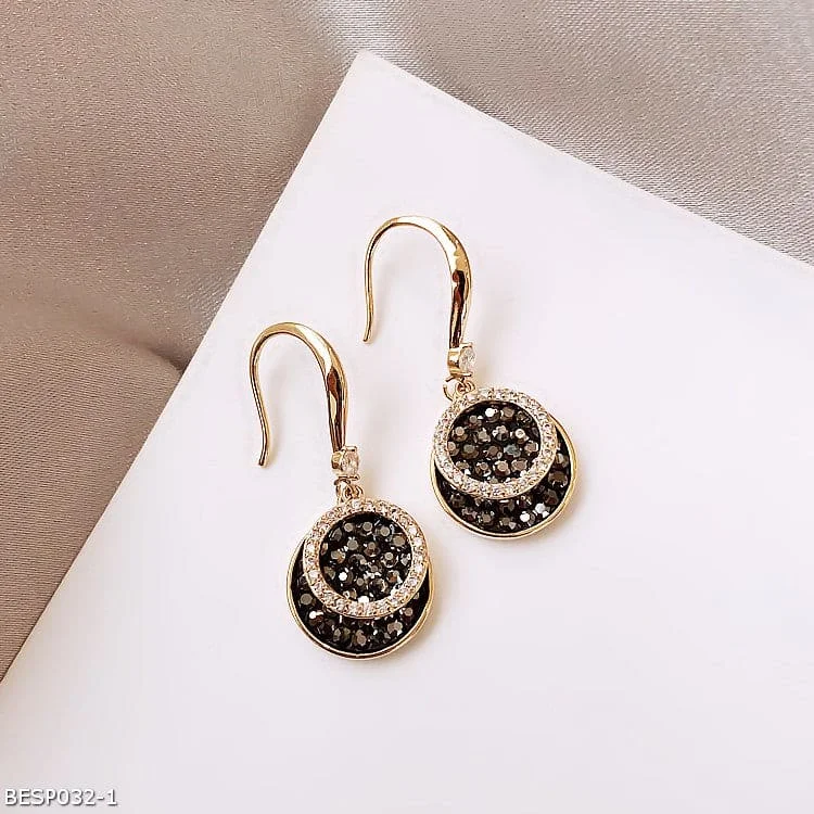 Black disc diamond earrings